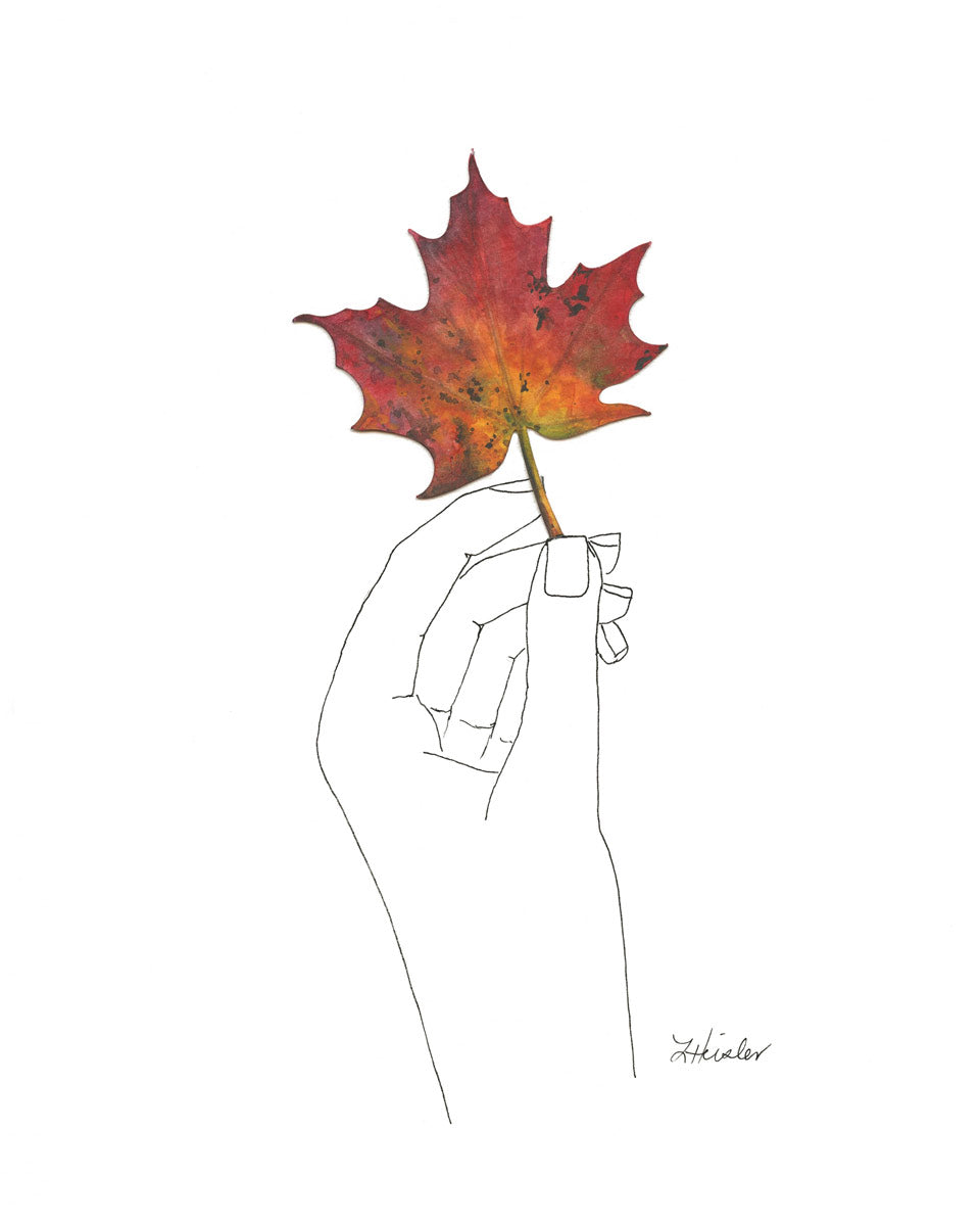 ink drawn hand with watercolor fall leaf