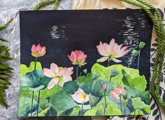 hand painted watercolor lotus pond in the moonlight with rich blues, greens, and pinks.