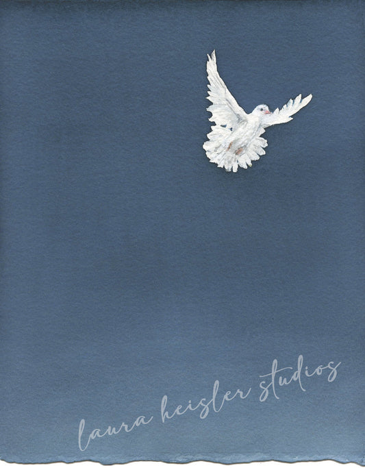 White dove ascending into a clear blue sky.